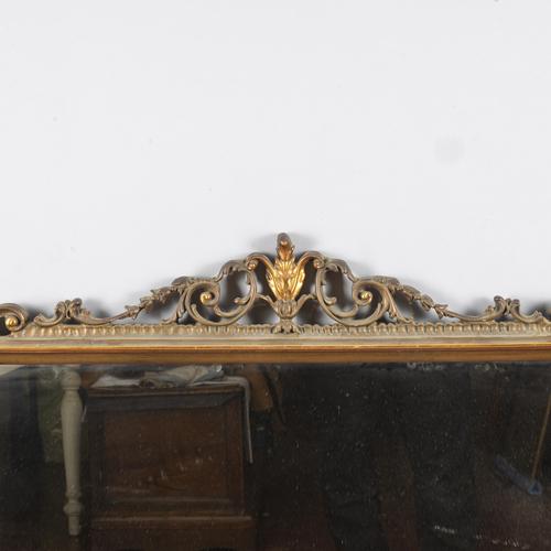 This imposing sideboard mirror, dating back to the early 20th century, embodies the elegance and solidity of italian...