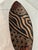 Vintage artisanal African carved wood canoe shaped shallow bowl in earth-tone shades featuring a hand-painted decorative...
