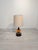 Fat Lava Ceramic Table Lamp from the 1960s/1970s Stylish table lamp with an orange ceramic ball base. The lampshade is...