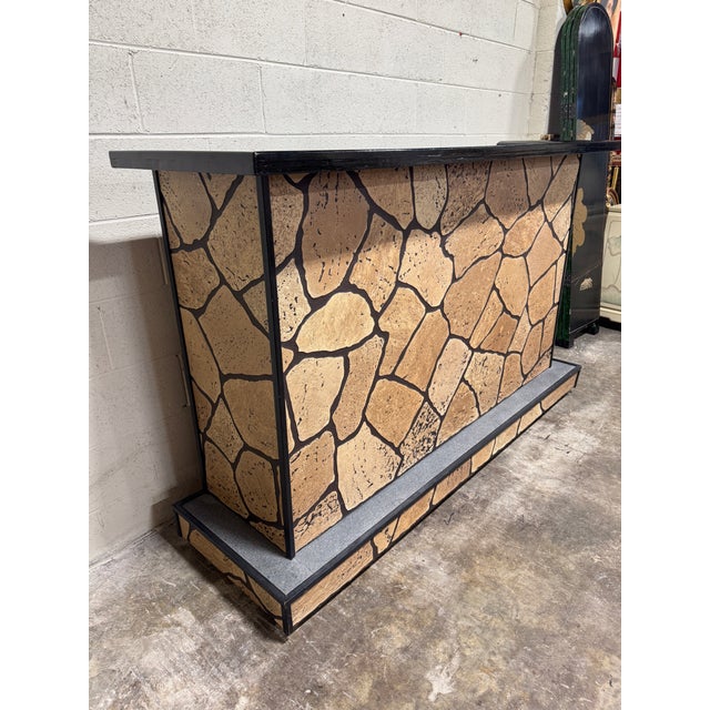 This is a handmade piece. Solid would construction with faux stone/cork veneer. Super functional. On casters. Great for a...