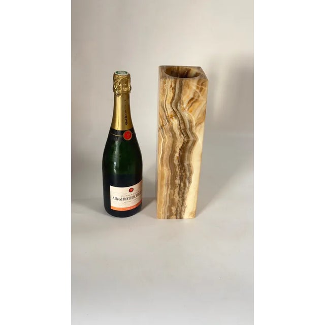 This exquisite Italian vase from the 1960s is crafted from natural onyx, showcasing the timeless elegance and...