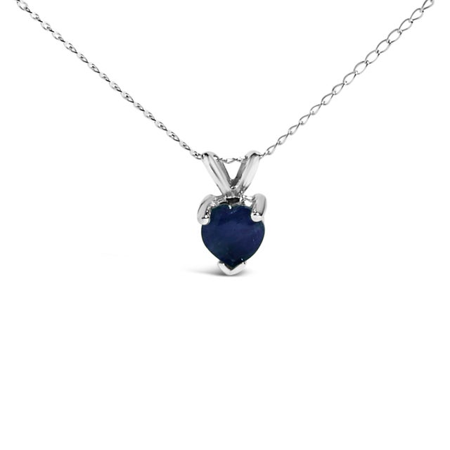 Evoke the essence of eternal elegance with this captivating pendant necklace, featuring a heart-shaped sapphire, a symbol...