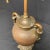 Dated from the early 20th century Bronze urn lamp. Intricate detailing and weighted. Needs to be professionally rewired.