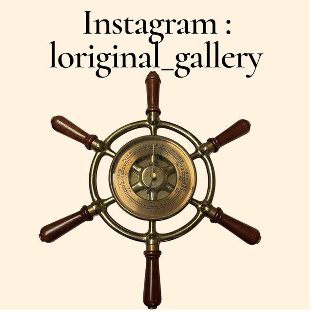 Bronze and Wood Compass from Hermès, 1970s, in Good conditions. Designed 1970 to 1979 This piece has an attribution mark,...