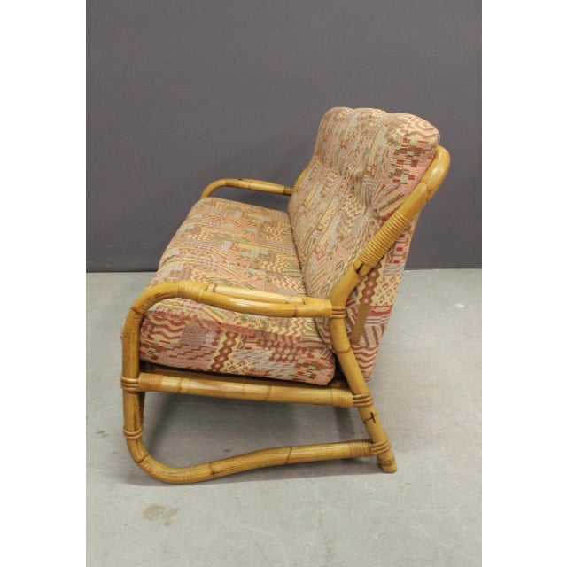 Three-seater rattan sofa, seat and back in good condition, seat height 45 cm, circa 1970, overall in good condition