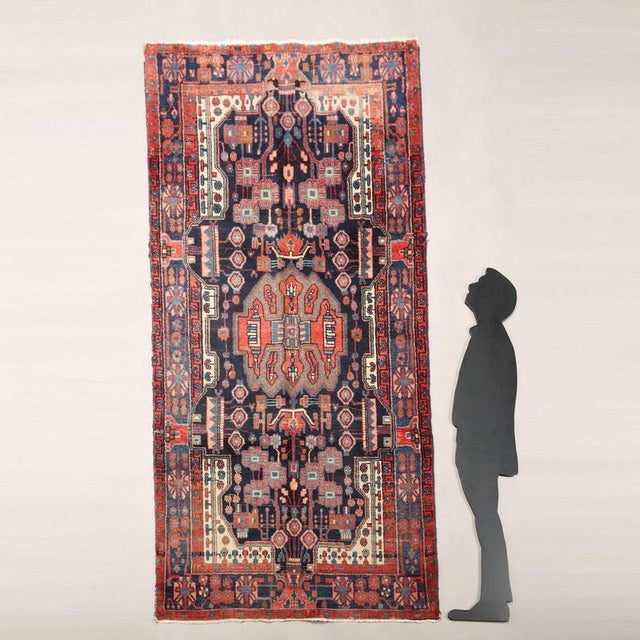 Nahavand rug in cotton and wool, large knot, hand-made. This piece is attributed to the mentioned designer/maker. It has...