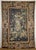 The large hand-woven tapestry depicts a forest landscape, the deep vista of which is opened by massive trees with densely...