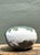 This vintage ceramic vase by Tony Evans showcases his signature crackle glaze technique. The robust, rounded form is...