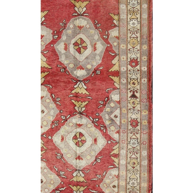 Red background vintage Turkish Oushak runner in grey, cream, yellow colors, rug enc-92462, country of origin / type:...