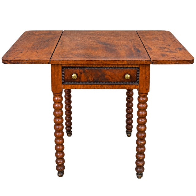 Fabulous antique Sheraton-style drop leaf side table. Curly tiger maple trim on the top, on the leaves and around the...
