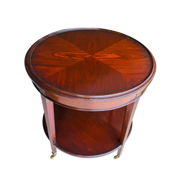 Late 20th Century Vintage Mahogany Two-Tier Side Table | Bookmatched Starburst Top | Fluted Legs | Brass Caster Feet For Sale - Image 5 of 11