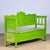 A charming bench from hungary with the original paint. Over time and use, the green paint has been worn away in places to...