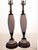 Elevate your interior with this exceptional pair of vintage mid-century table lamps, showcasing a sophisticated blend of...