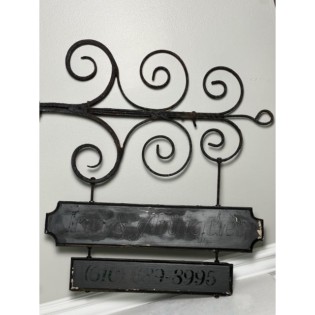Rustic Large Antique Wrought Iron Bracket With Two-Tier Wooden Sign, "Inn & Antiques" For Sale - Image 3 of 10