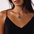This elegant Mid Century diamond, ruby, and jade necklace is a timeless 1950’s design, featuring 25 single and round...