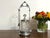 Antique Rogers, Smith & Co. pickle castor with Victorian quadruple-plated frame, pressed glass insert, fitted lid, and...