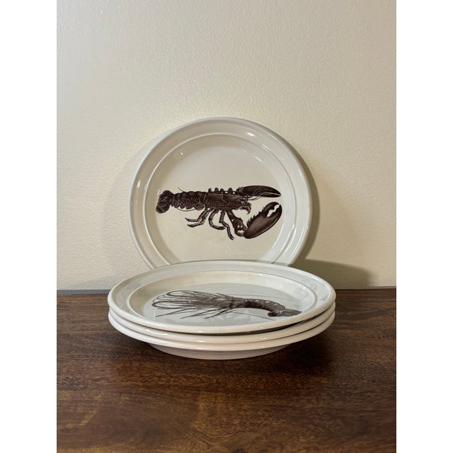 A rare and highly collectible set of Portmeirion “Kingdom of the Sea” dinner plates, produced in England in the early...