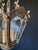 The chandelier is made of brass and bronze - a beautiful artistic forging. Decorated with glass inlays with ornaments....