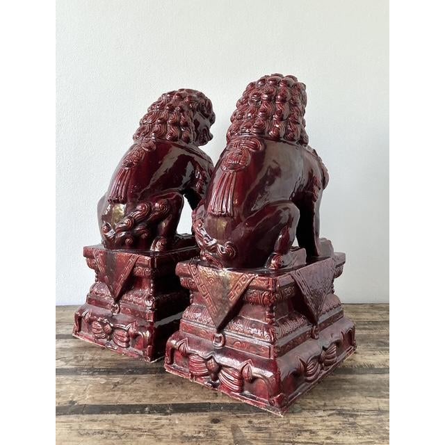 Late 20th Century Vintage Asian “Sang De Bouf” Foo Lions - A Pair For Sale - Image 5 of 12