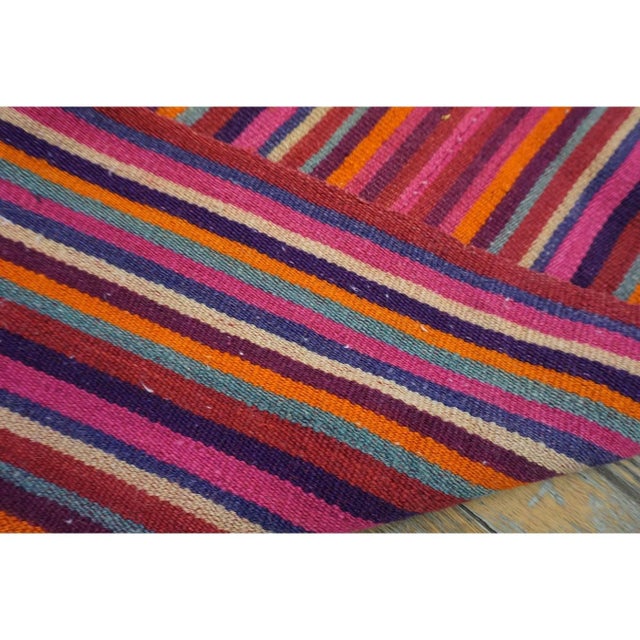this mid-20th-century Turkish Decorative textile is a beautiful testament to Anatolian tribal weaving craftsmanship....