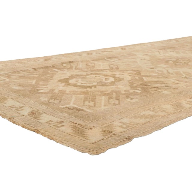 53715 Earth-Tone Vintage Turkish Kars Rug, 05'06 x 11'00. Emanating nomadic charm with incredible detail and texture, this...