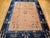 This vintage hand-knotted Chinese Peking rug from the late 19th century embodies the meditative elegance that has made...