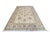 Afghan Oushak rug, hand-knotted in Afghanistan from 100% wool. Measuring 8’4” x 11’2”, the rug features a traditional...