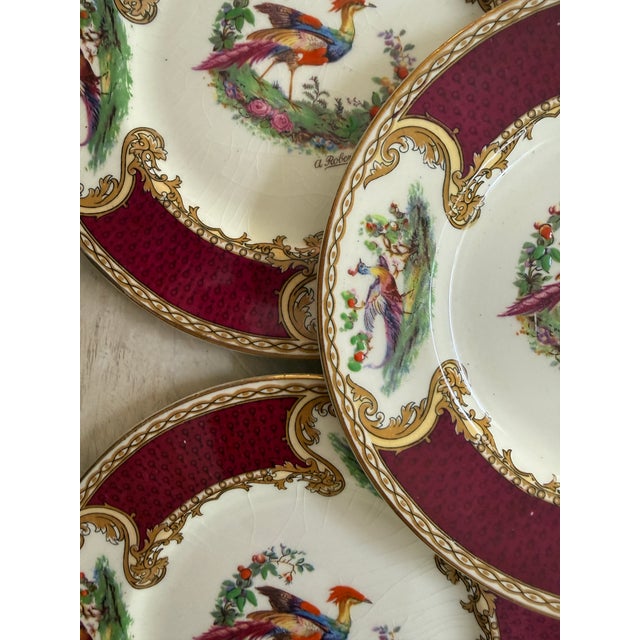 A beautiful and richly detailed set of eleven antique Myott bread or dessert plates in the sought-after “Chelsea Bird”...