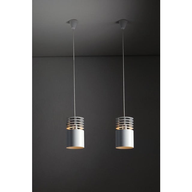 The "Hydra I" pendant is a sophisticated example of Danish minimalist lighting, designed by Jo Hammerborg for Fog & Mørup...