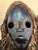 Vintage Dan mask 20th century. Shows signs of wear ant tear from aging. Black in color with faded patina . 10 inches hight...
