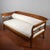 This imposing three-seater sofa represents an excellent example of italian modernism, featuring a solid and welcoming...