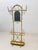 An exceptional freestanding coat rack made of cold-forged iron, dating from 1956. The elaborately crafted piece is...