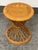 Design Plus Gallery presents a Vintage Rattan Hourglass Stool. A rounded woven rattan seat sits above an open lattice...