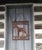 Ebony Vintage Folk Art Metal Terrier Dog House Sign From 1915, 24” X 21” For Sale - Image 8 of 8