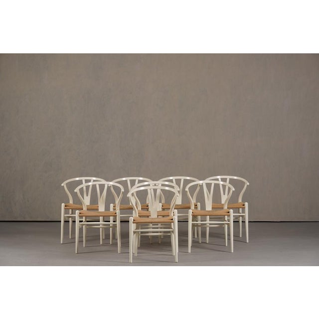 The Carl Hansen & Søn Wishbone Chair (CH24) in Natural Hardwoods celebrates Hans J. Wegner's 1949 masterpiece through the...