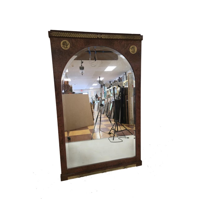 This large amazing mirror can reflect an entire person while being framed with its beautiful wood veneer and bronze...