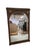 This large amazing mirror can reflect an entire person while being framed with its beautiful wood veneer and bronze...
