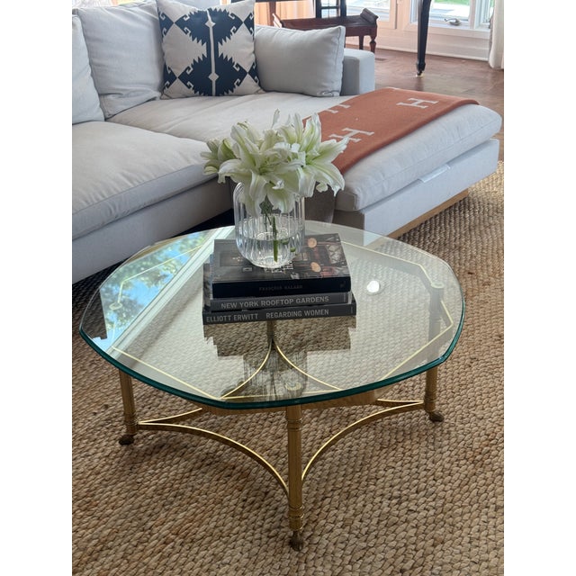 Beautiful Hollywood Regency mid-century cocktail table in the manner LaBarge. Great for small to large spaces. The brass...