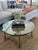Beautiful Hollywood Regency mid-century cocktail table in the manner LaBarge. Great for small to large spaces. The brass...