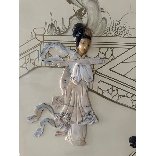 This is an elegant, large-scale four-panel folding screen featuring a hand-painted Chinese landscape with architectural...