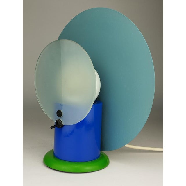 Round Table Lamp by Michele De Lucchi for Bieffeplast, 1983, in Good conditions. Designed 1980 to 1989 This piece has an...