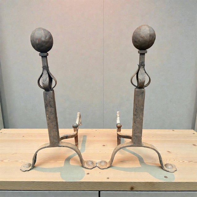 Antique cast iron cannonball fireplace andirons with a splayed base Fireplace andirons, also known as firedogs or dog...