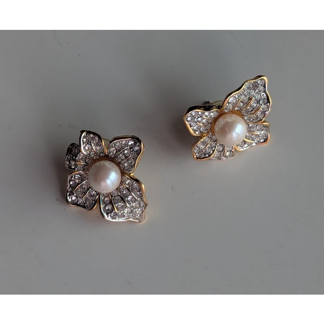 Vintage faux pearl with rhinestones set in gold tone metal, large flower, earrings. AFJ stands for American Fashion Jewelry.