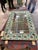 Scenographic artistic venetian wall mirror with green flowers Murano glass. A mix of colors that give a touch of...