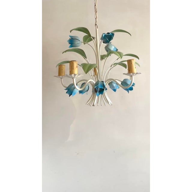 French tole chandelier with five candle arms and hand-painted blue tulips and green leaves, circa 1960s–1970s. Up to 250V...