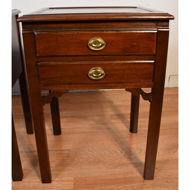 we are pleasured to offer this nice pair of night stands with lather top . they are in very good condition. completely...