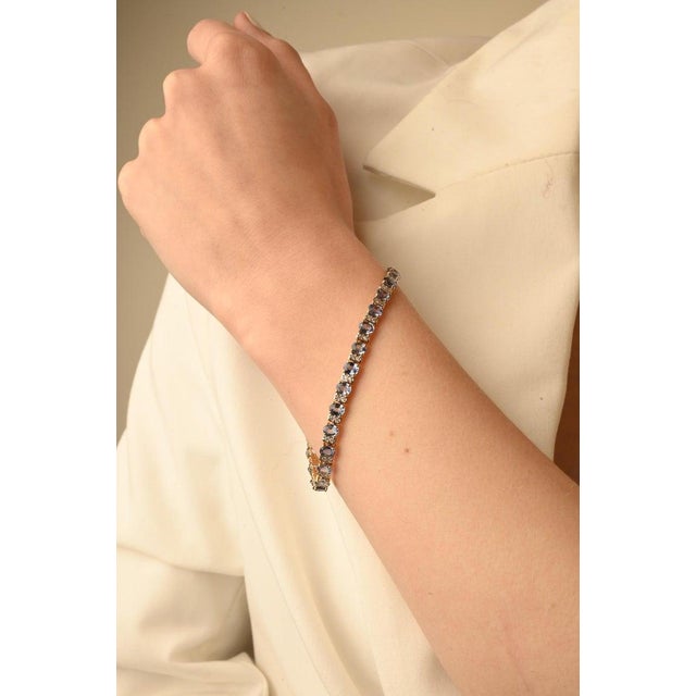 Tennis Bracelet With Blue Sapphire and Diamonds Set in Solid 14k Yellow Gold For Sale - Image 4 of 8
