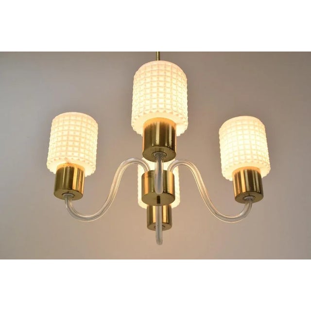 Made in czechoslovakia. Made of glass and brass. With aged patina 4x e27 or e26 bulb. Good original condition. Us wiring...
