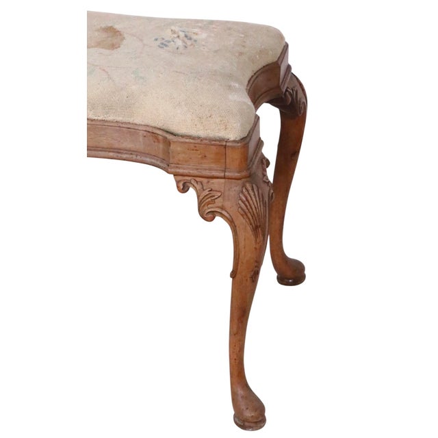 Large vintage Chippendale style bench, having six legs and an elegant shaped upholstered pad seat cushion. The wood frame...
