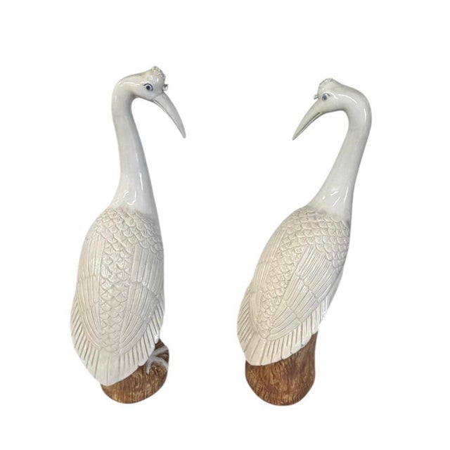 This elegant pair of ceramic cranes offers a sophisticated touch of Chinoiserie-inspired decor. Standing at 17 inches...